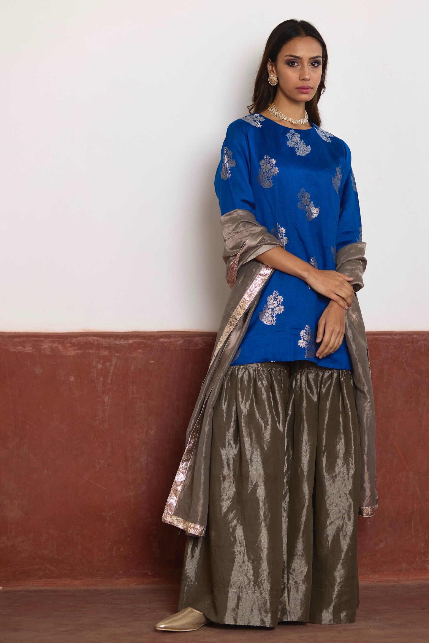 Zero Neck Short Kurta in Blue Brocade with Silver Tissue Sharara