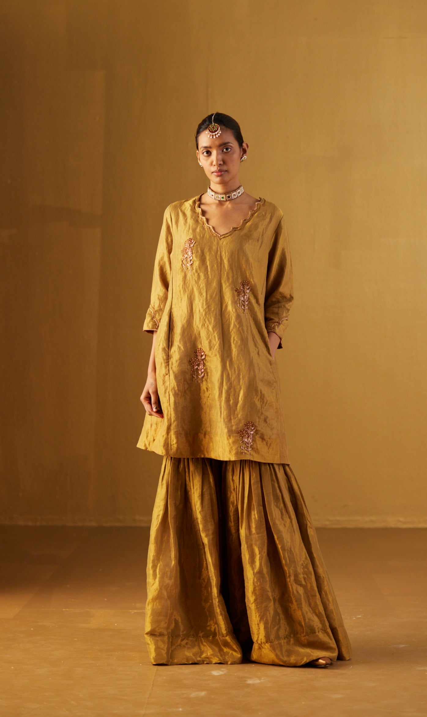 Tannu Kurta in Gold Tissue with Gold Sharara