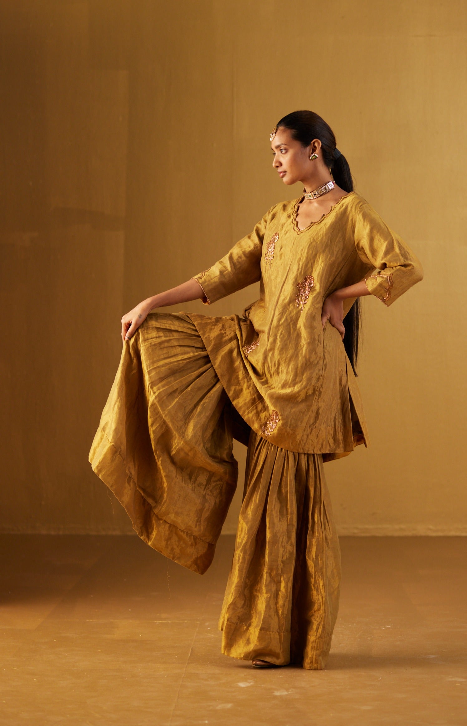 Tannu Kurta in Gold Tissue with Gold Sharara