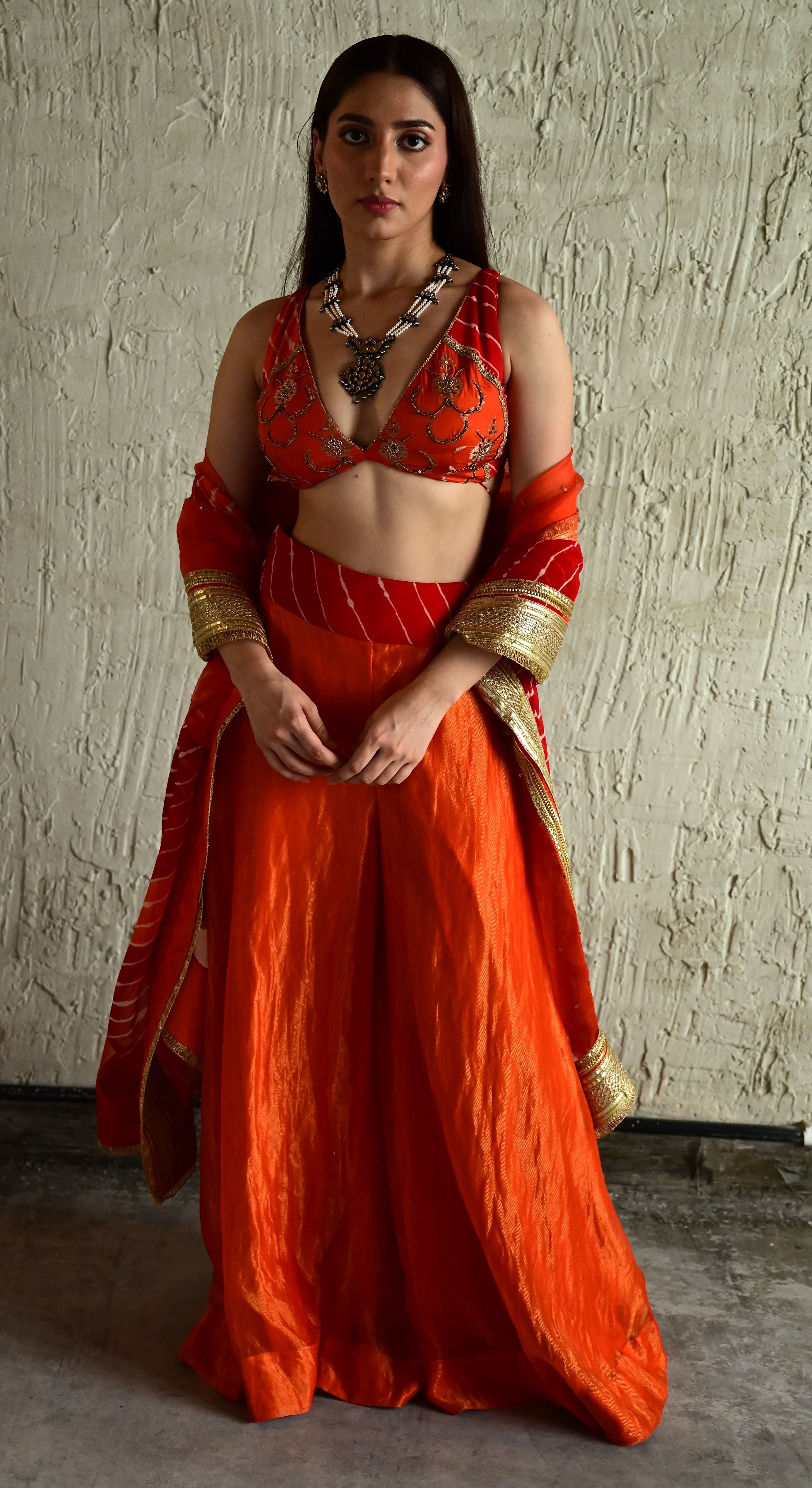 Madhuri Sleeveless Choli With Orange Garara