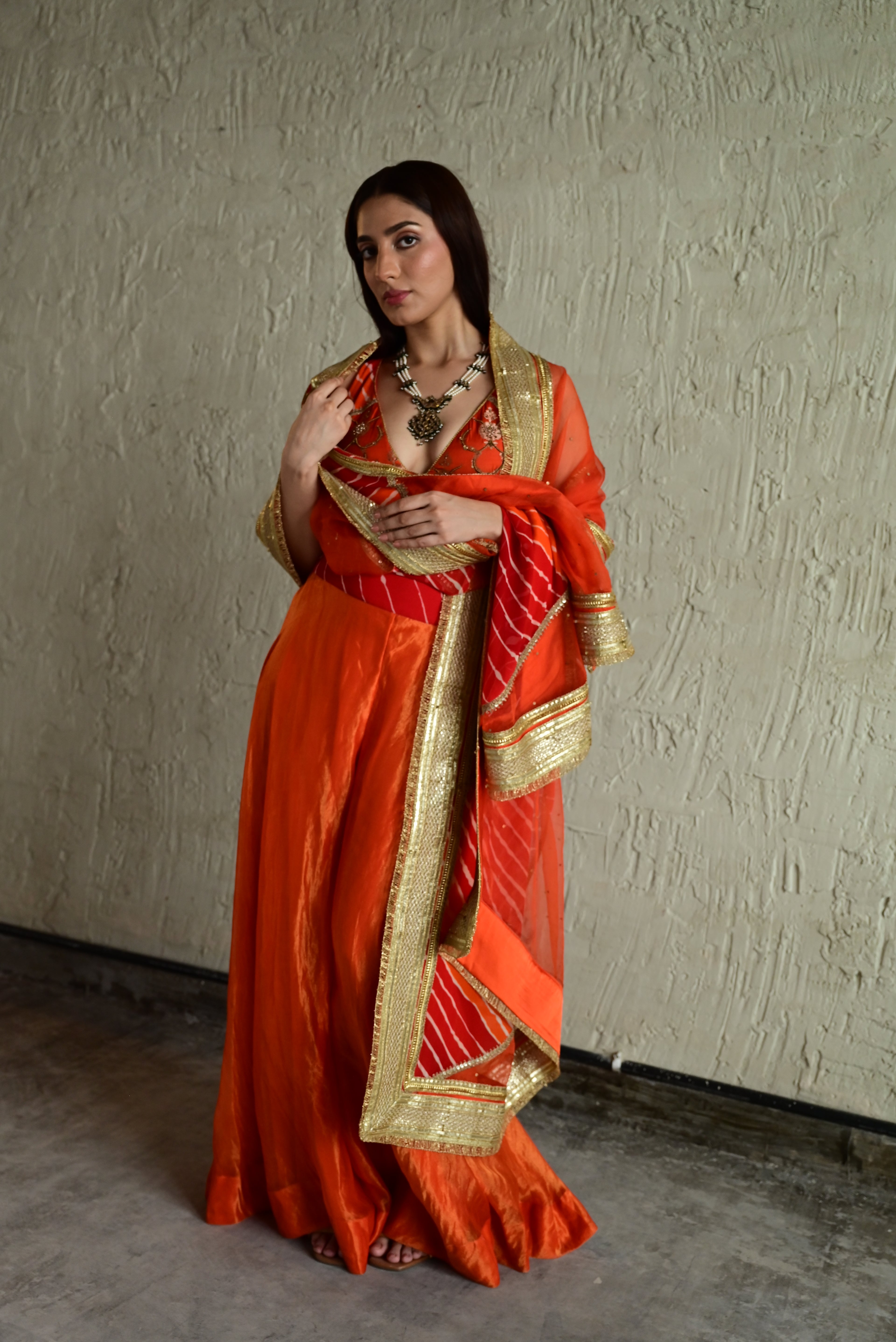 Madhuri Sleeveless Choli With Orange Garara