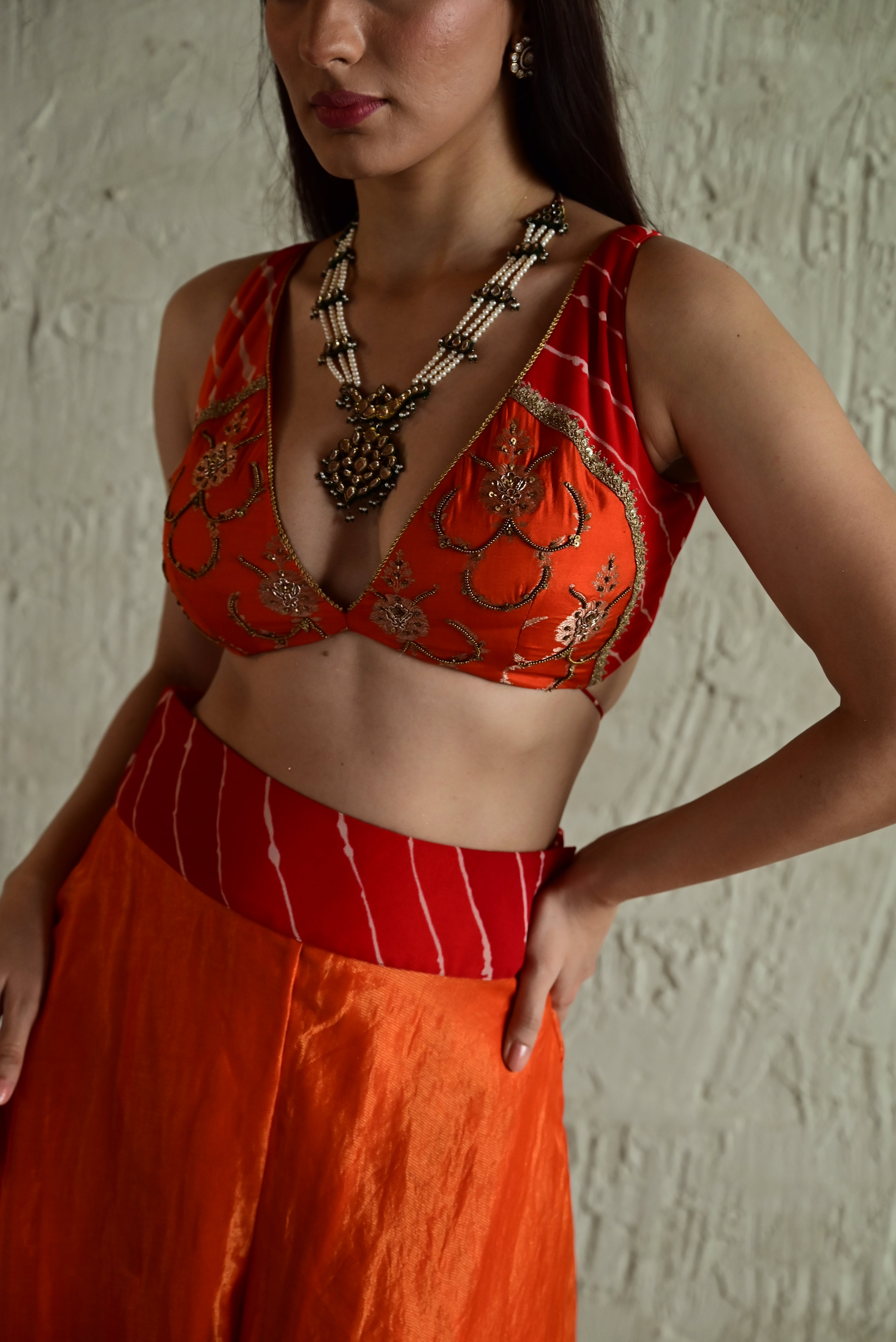Madhuri Sleeveless Choli With Orange Garara