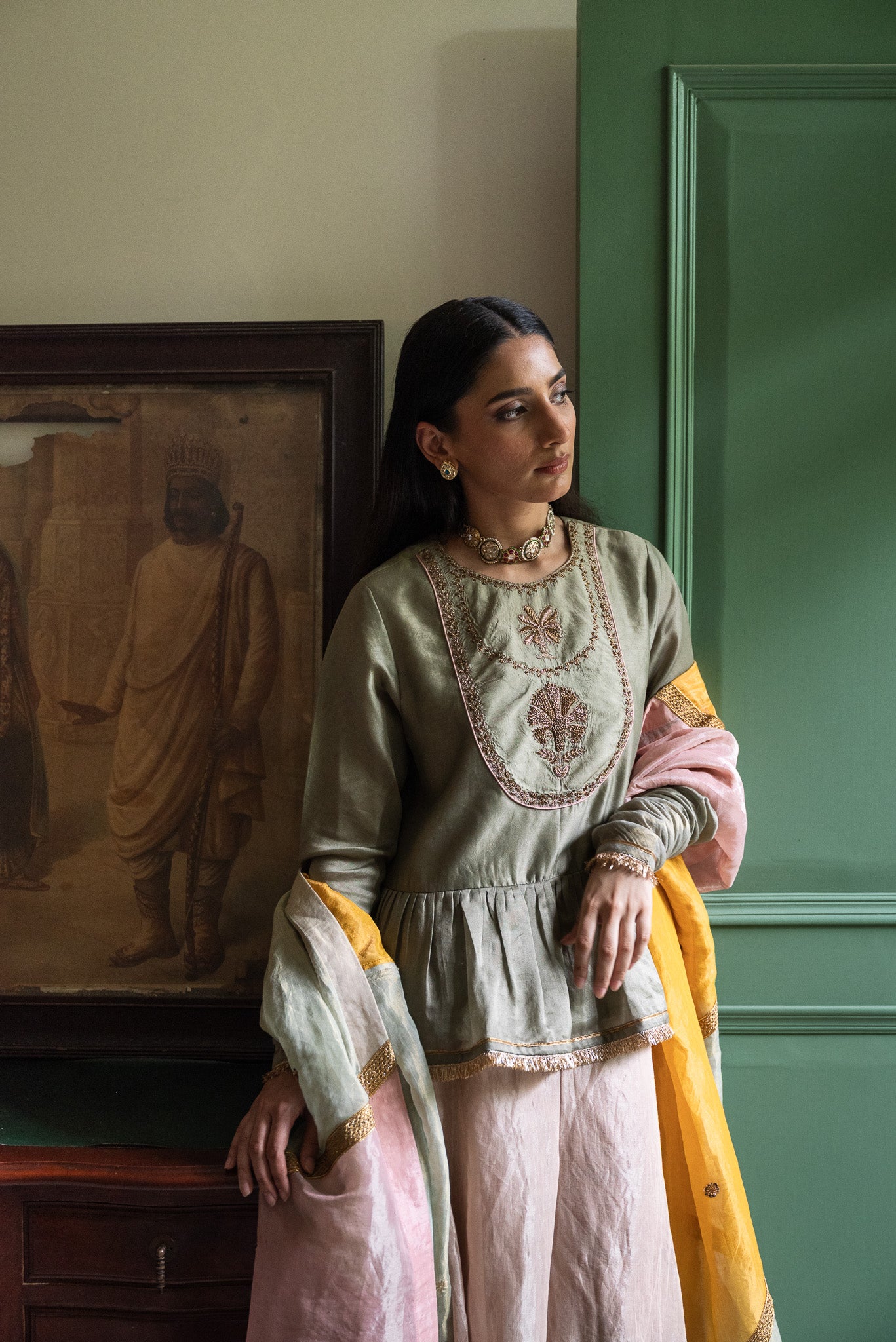 Nur Kedia in Pista Green with Pink Tissue Garara