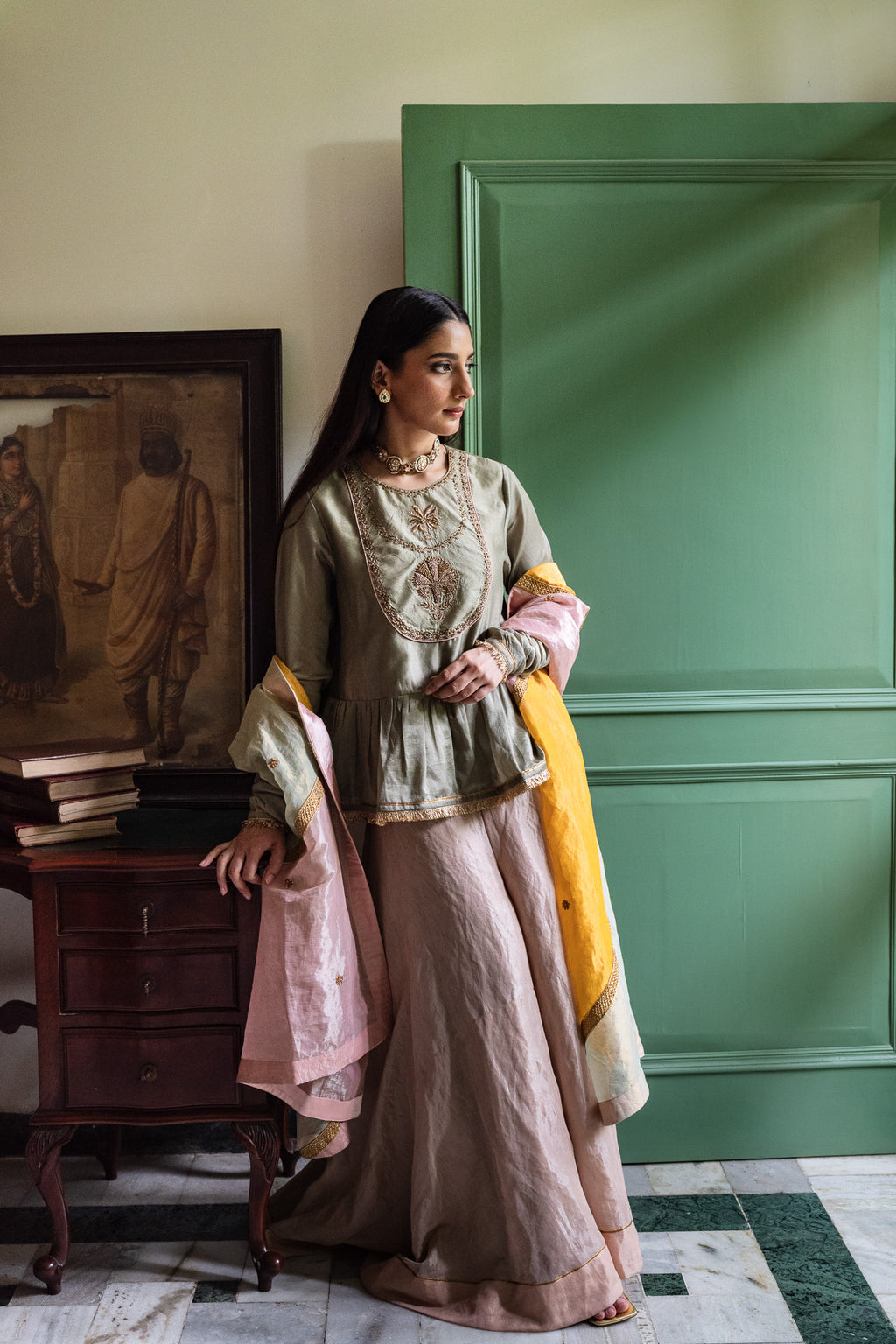 Nur Kedia in Pista Green with Pink Tissue Garara