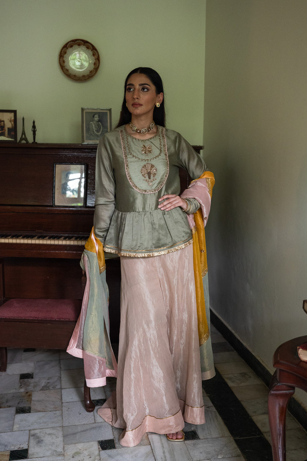 Nur Kedia in Pista Green with Pink Tissue Garara