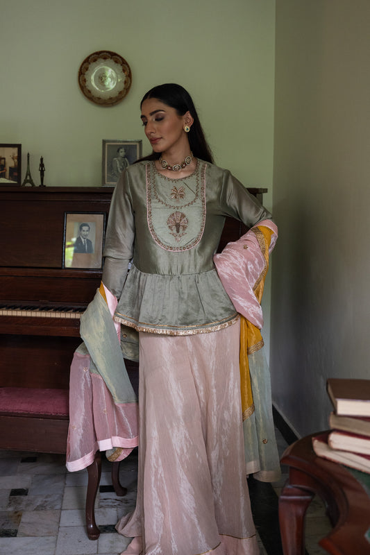 Nur Kedia in Pista Green with Pink Tissue Garara