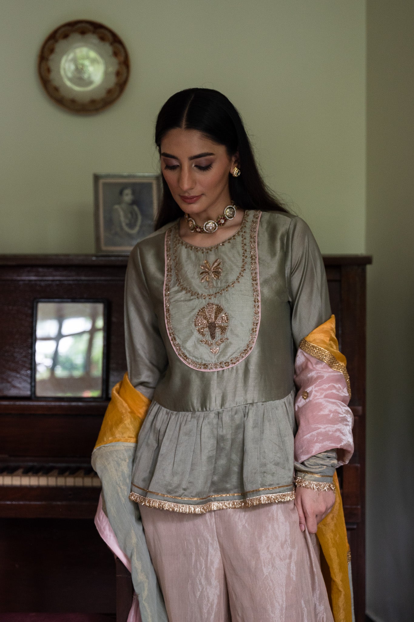 Nur Kedia in Pista Green with Pink Tissue Garara