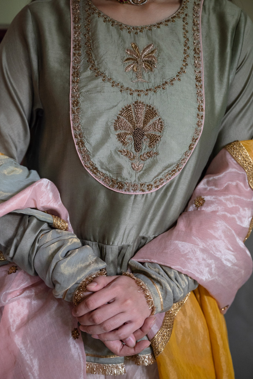 Nur Kedia in Pista Green with Pink Tissue Garara