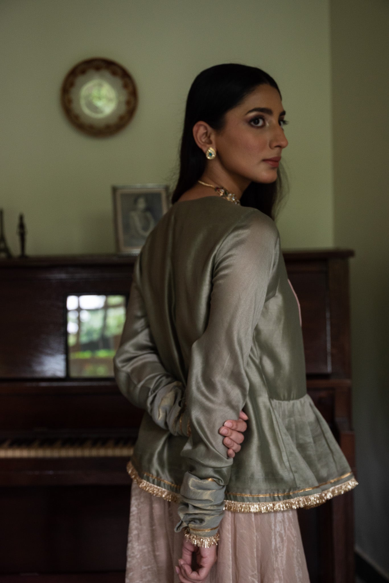 Nur Kedia in Pista Green with Pink Tissue Garara