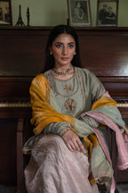 Nur Kedia in Pista Green with Pink Tissue Garara