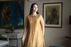 Cleo Sleeveless Maxi dress in Gold Crushed Tissue with Anil Jacket in Red Silk