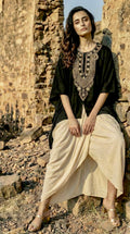 Begum in black with beige dhoti pant