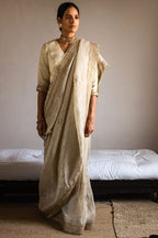 Saree hand embroidered in Ivory Handloom tissue
