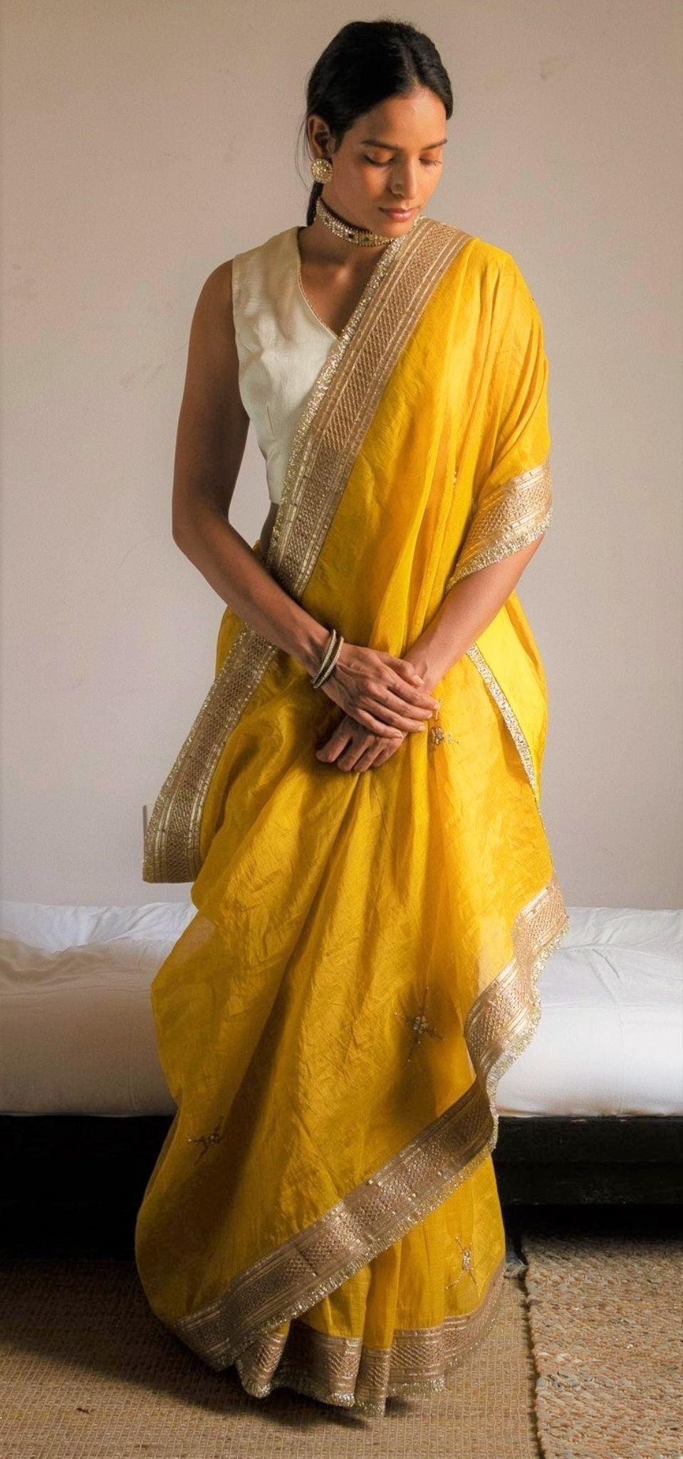 Saree hand embroidered in Yellow Handloom tissue