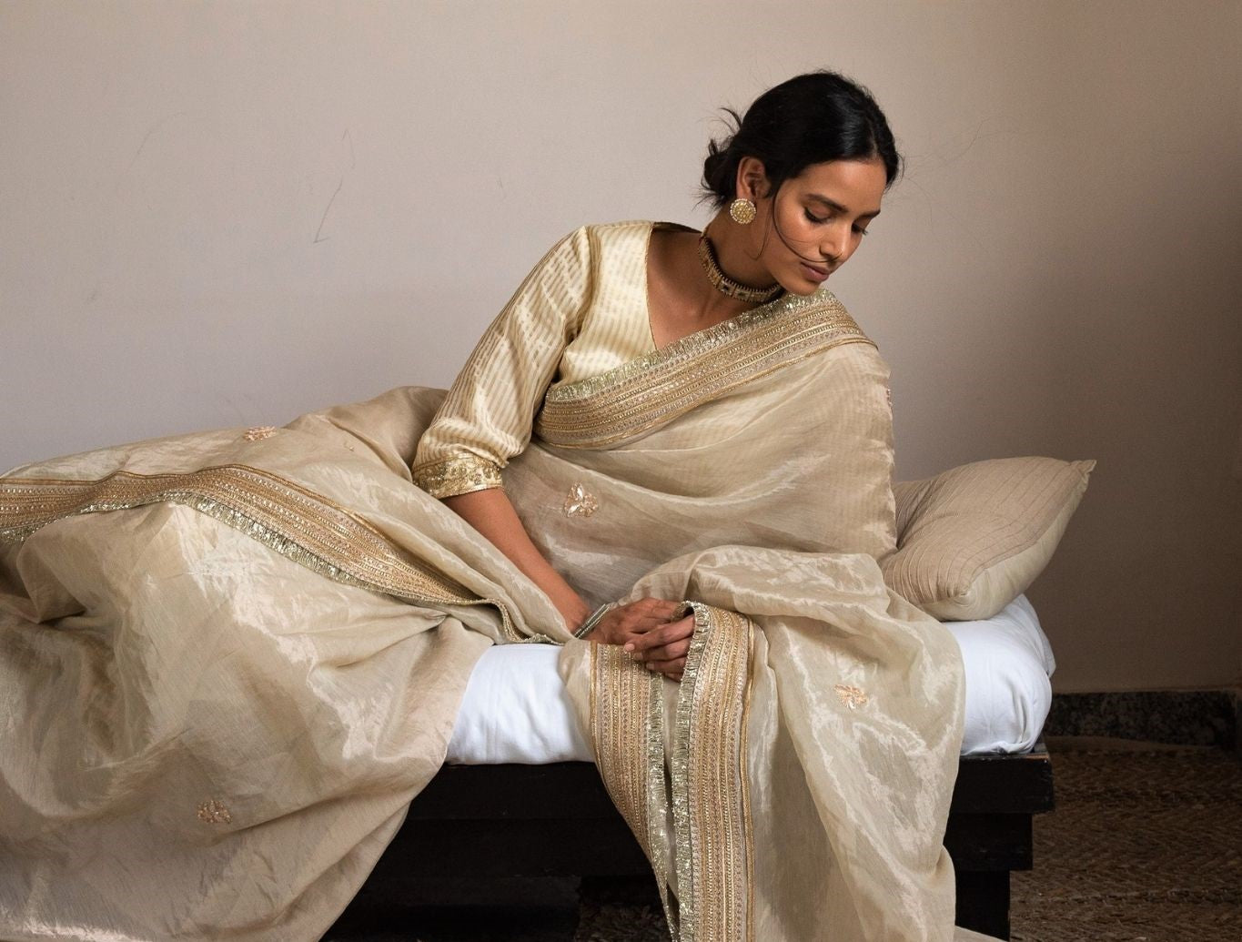 Saree hand embroidered in Ivory Handloom tissue