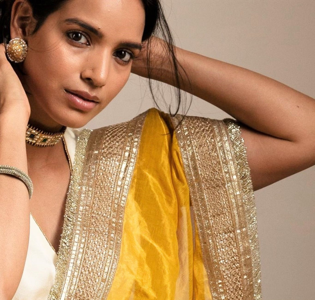 Saree hand embroidered in Yellow Handloom tissue